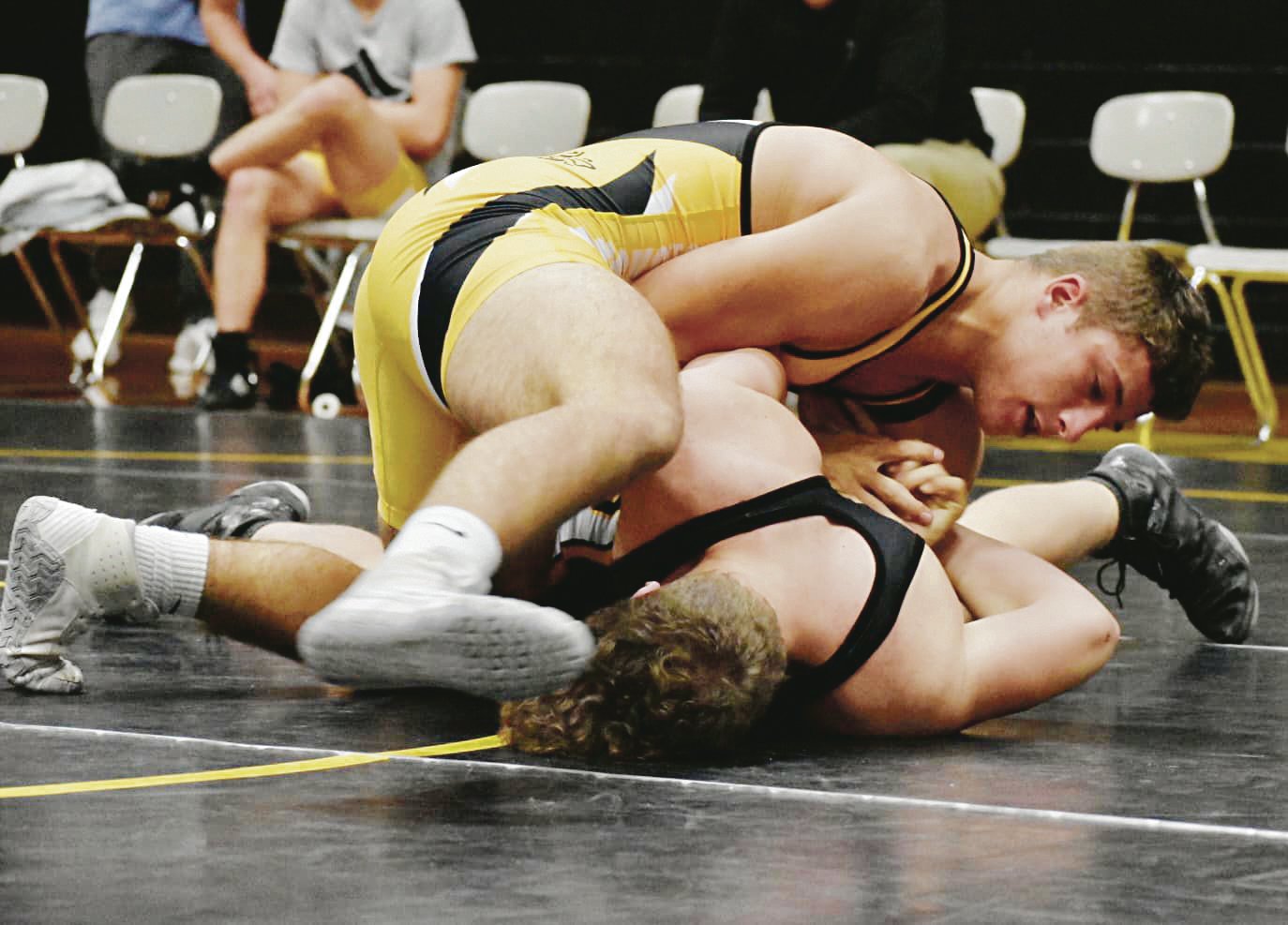 Photo by Nancy Smith
Lebanon junior Cade Muscia (top) looks to flip Ben Cooper to his back during a Black and Gold wrestling scrimmage on Tuesday night at the LHS Wrestling Fieldhouse.