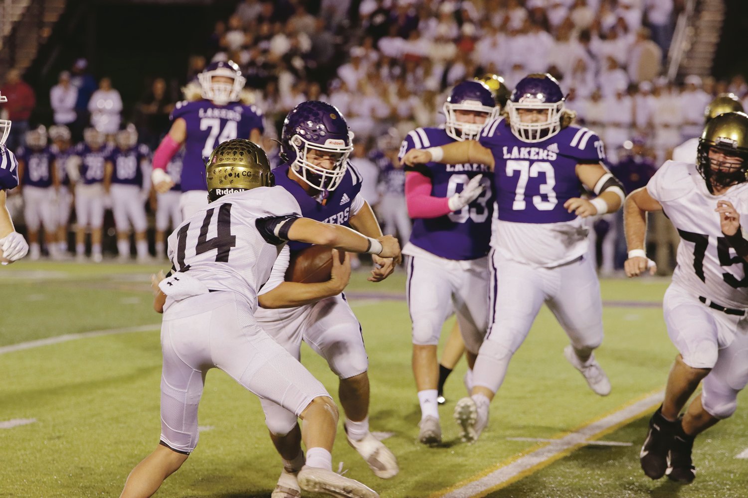 Camdenton’s Kam Durnin makes a run while Lebanon’s Drew Bowling (14) attempts to make a tackle.